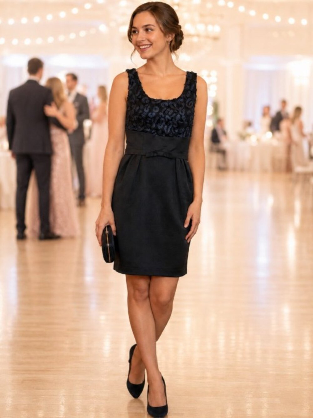 Elegant Taylor sleeveless cocktail dress in women’s size 2.